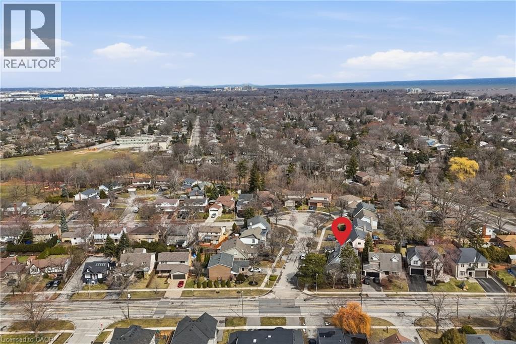View of property location with nearby suburban area