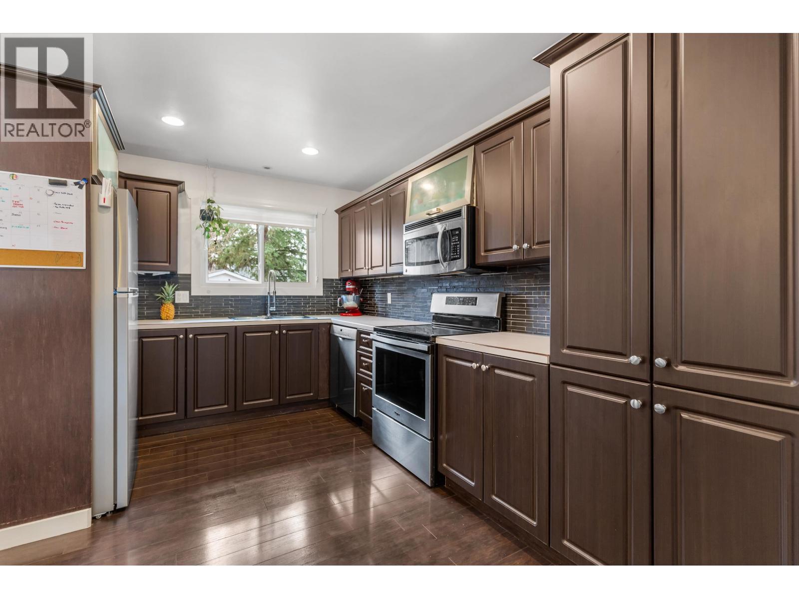 Photo 9 of 33 — 5696 BROCK DRIVE · Prince George, BC