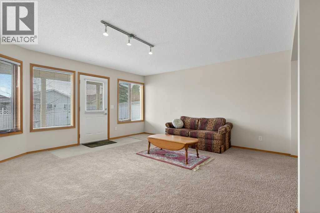 Single Family House Bungalow for Sale in  Arbour Wood Close NW Arbour Lake Calgary 