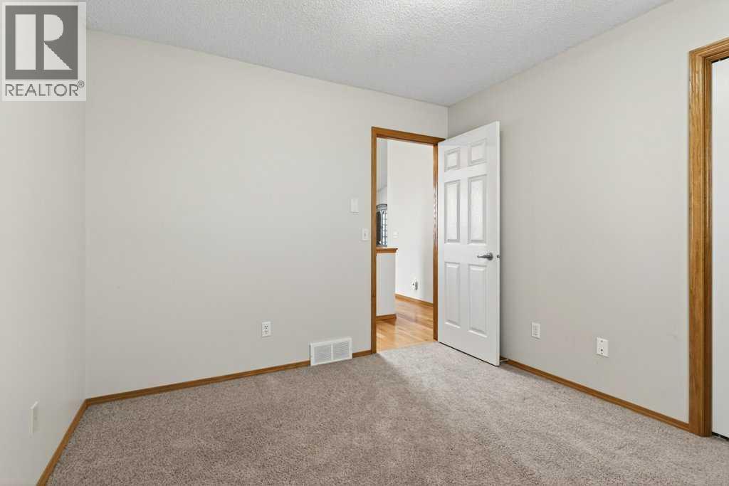 Single Family House Bungalow for Sale in  Arbour Wood Close NW Arbour Lake Calgary 