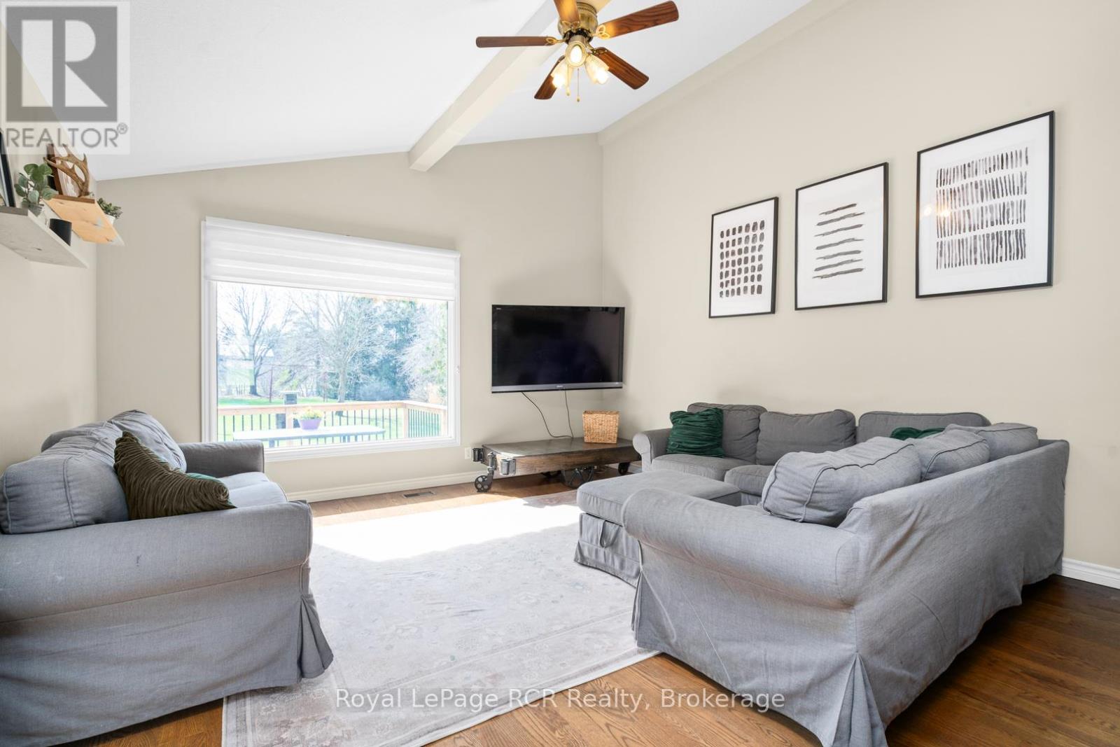 large picture window overlooking backyard