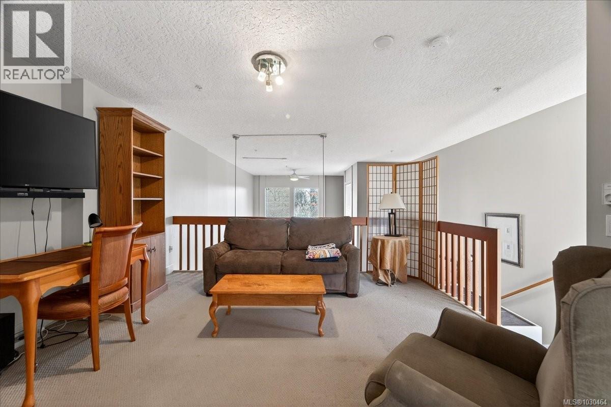 Open loft primary bedroom or living area