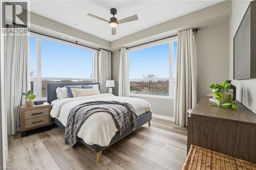 Bedroom featuring light wood-type flooring and a ceiling fan