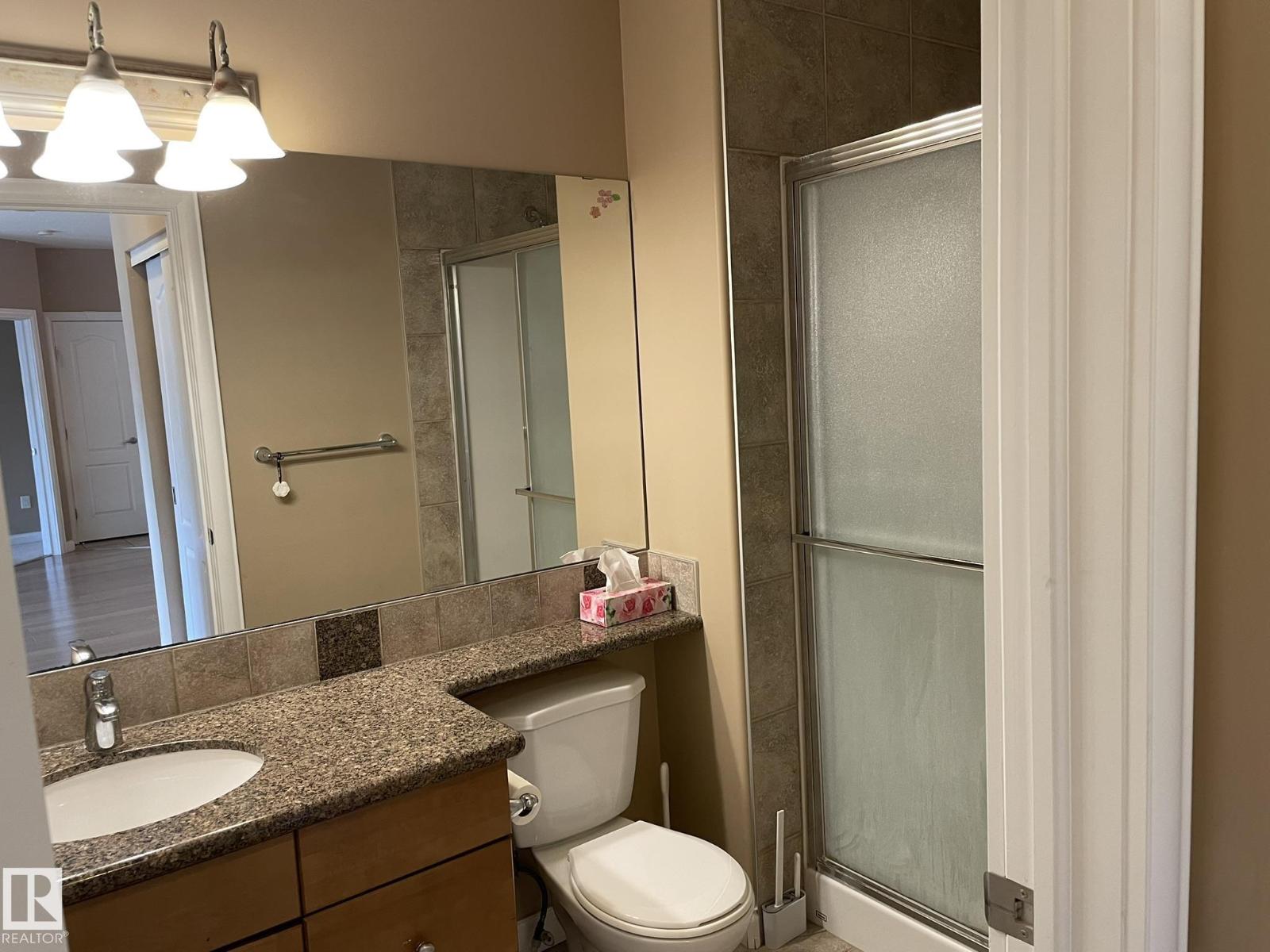 #211 1406 HODGSON WY NW - 25