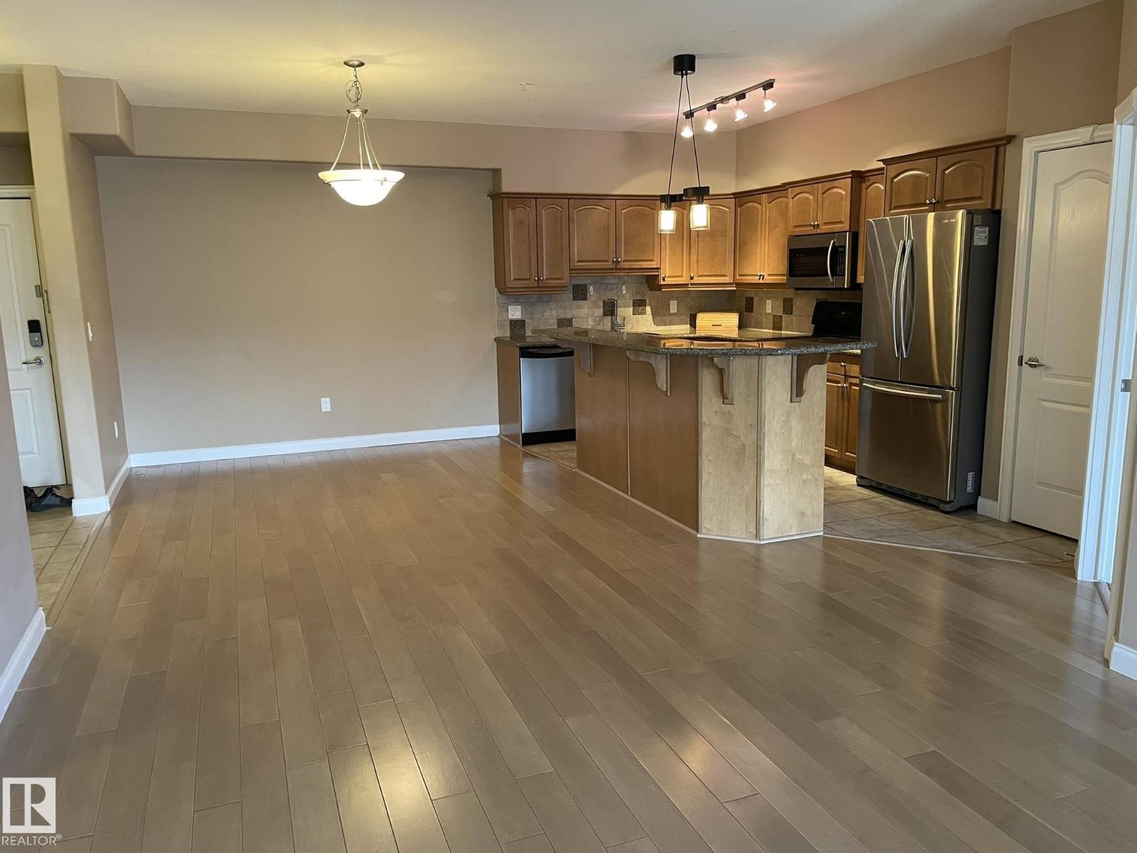 #211 1406 HODGSON WY NW - 28