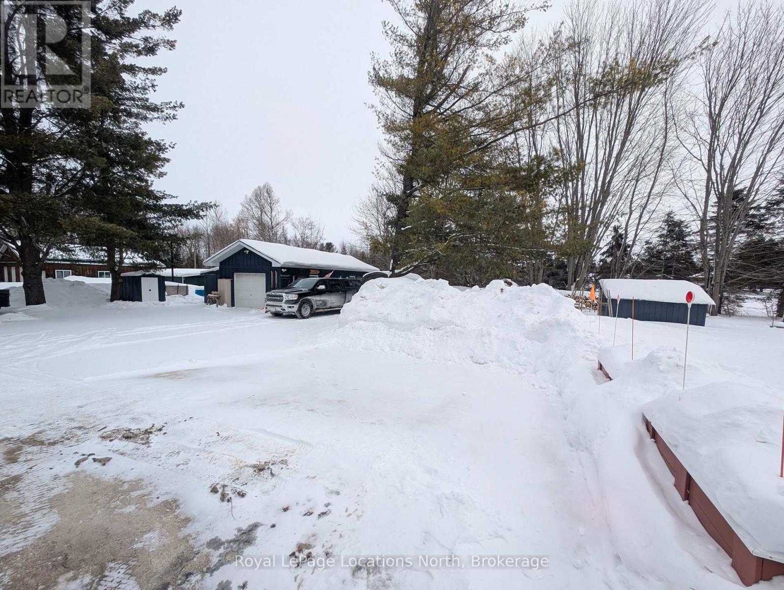 Over 600' workshop/garage plus loads of parking