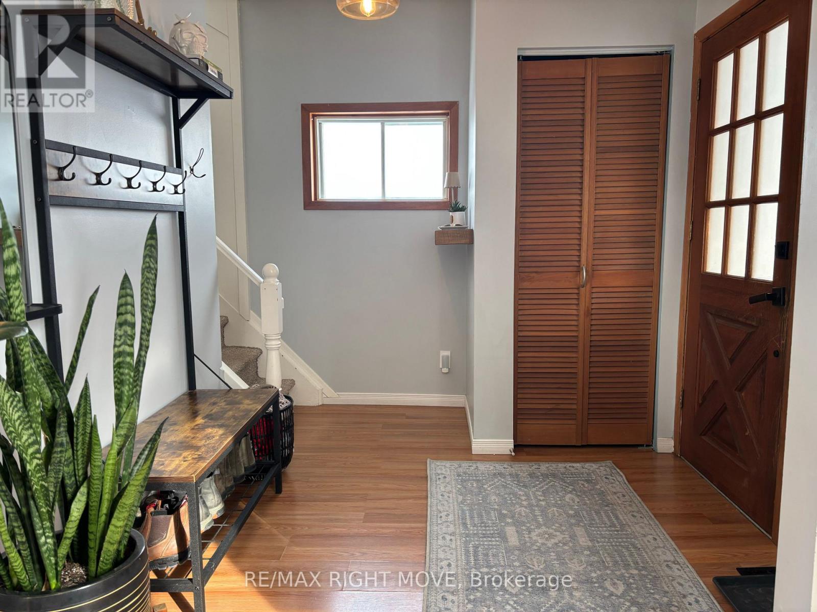 Welcoming foyer off enclosed porch