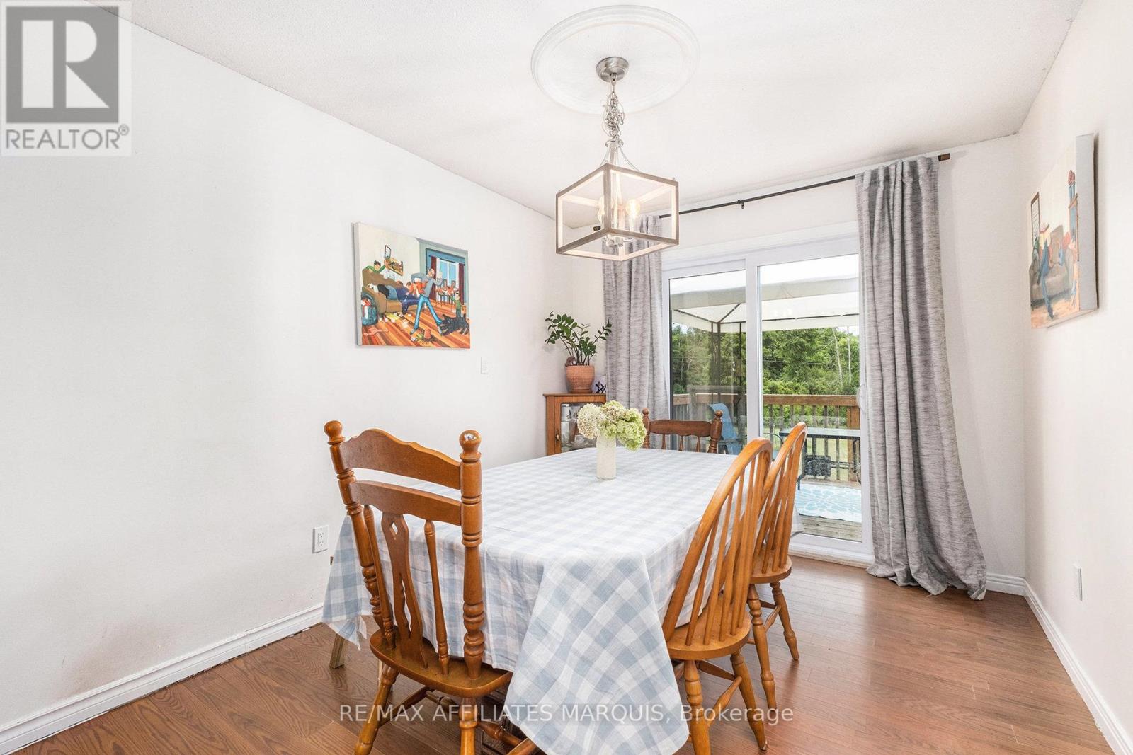 Dining room offers quick access to the backyard