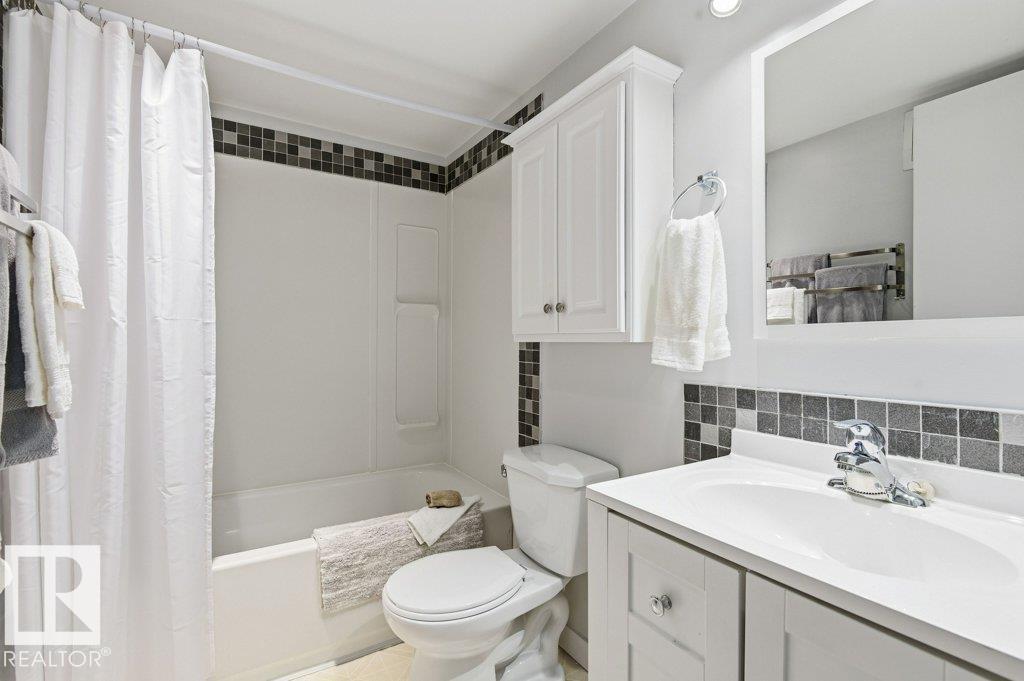 #124 5730 RIVERBEND RD NW - 25