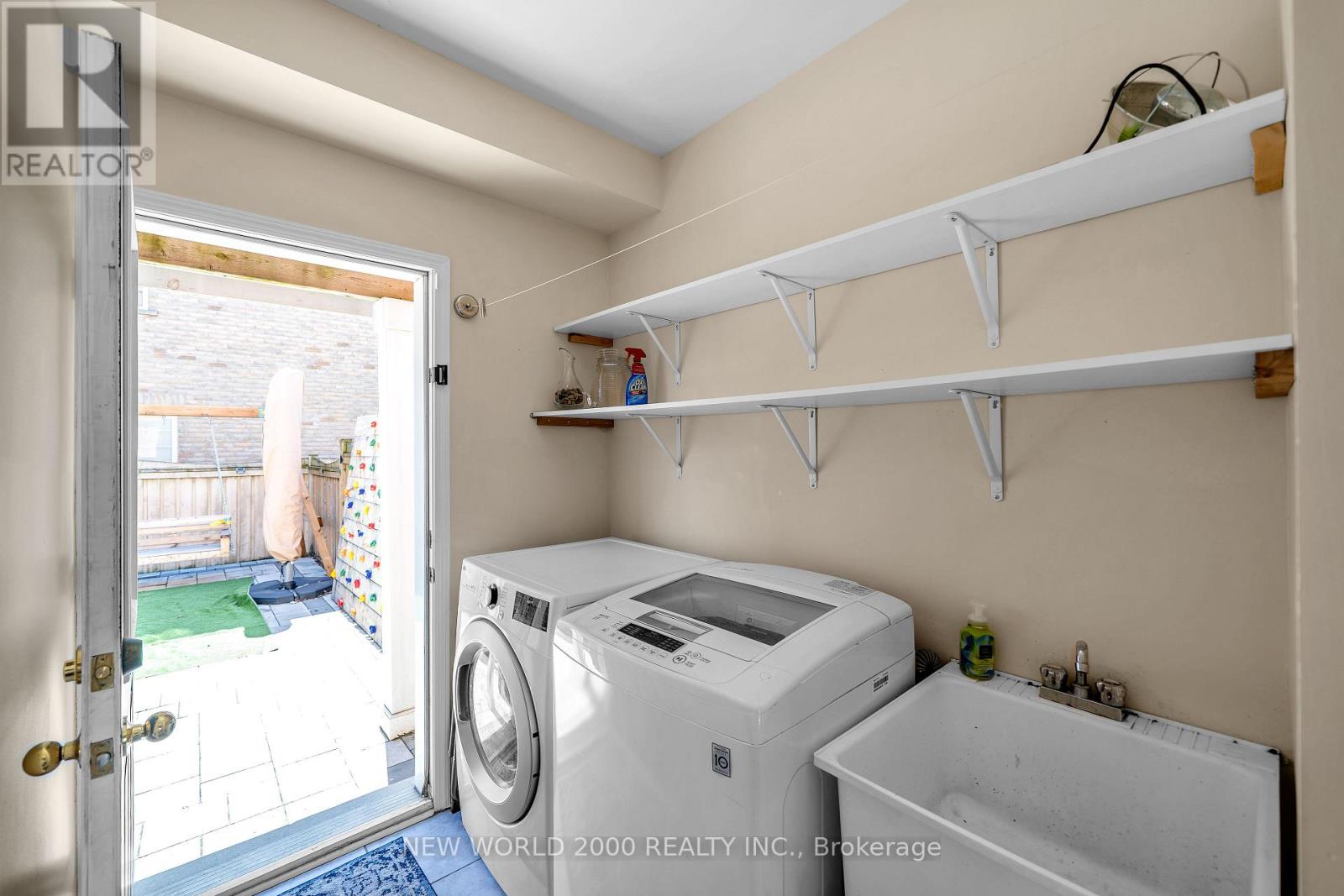 Laundry room with exit to backyard