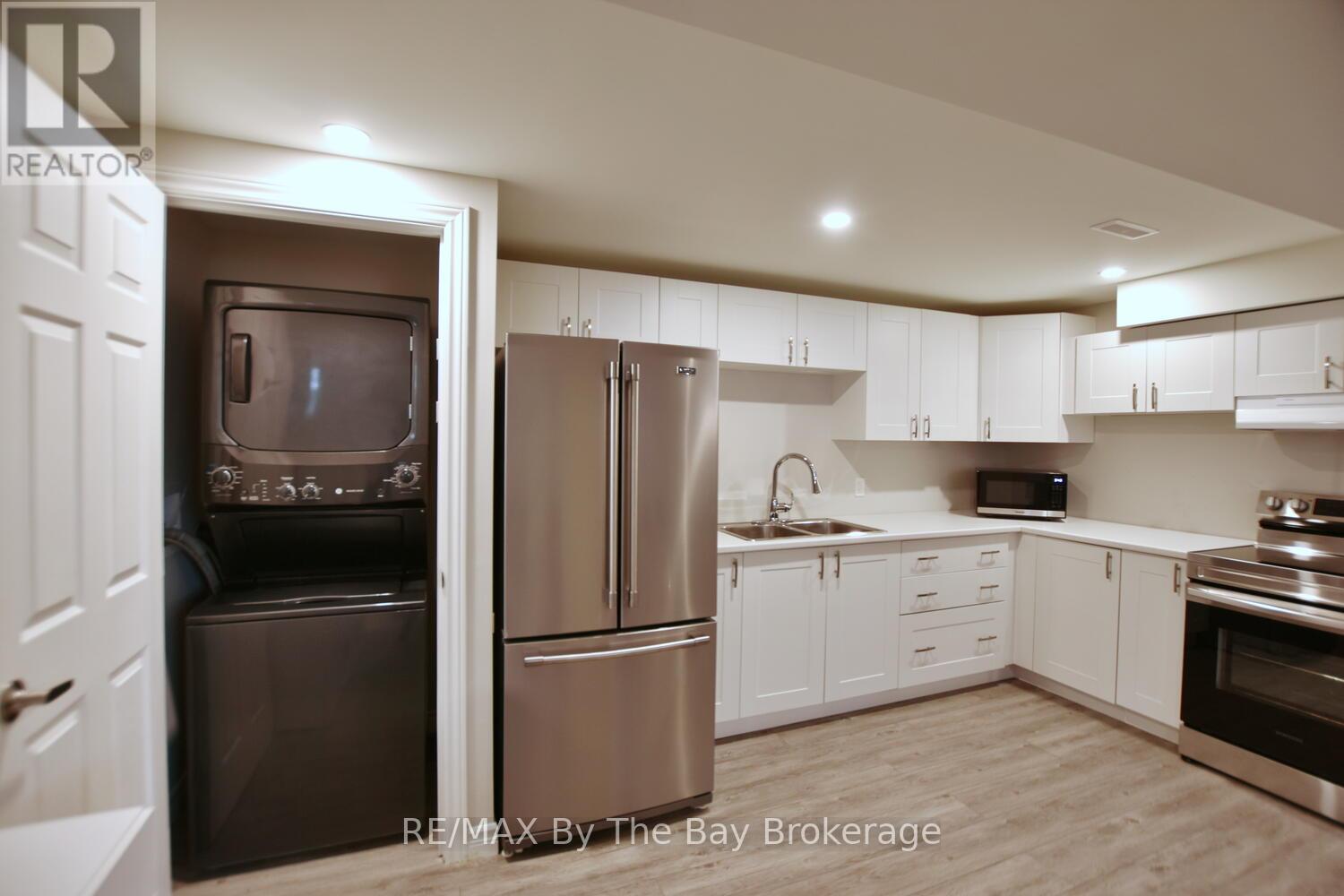 Apartment Kitchen with in-suite Laundry