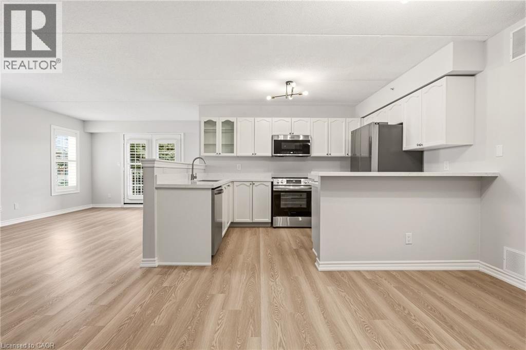 1820 WALKERS Line Unit# 213, Burlington, Ontario, L7M4V4 — Photo 4