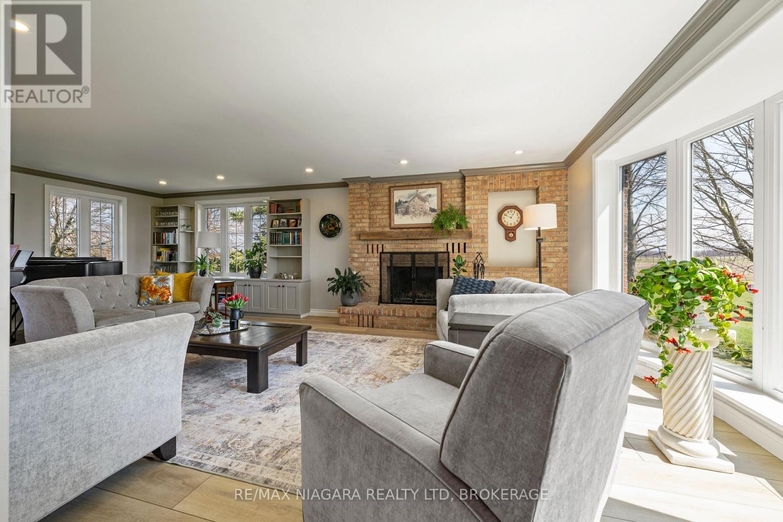 Wood burning fireplace, and lots of natural light