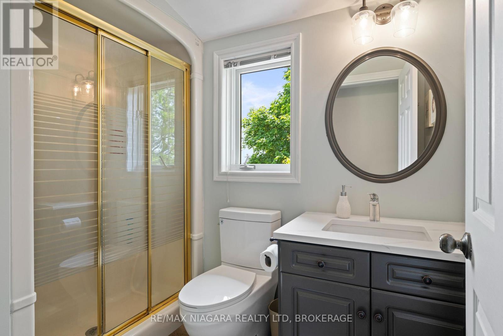 En-suite bathroom off primary bedroom