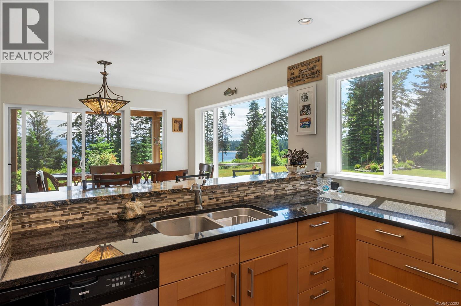 kitchen with granite counters & stainless steel appliances
