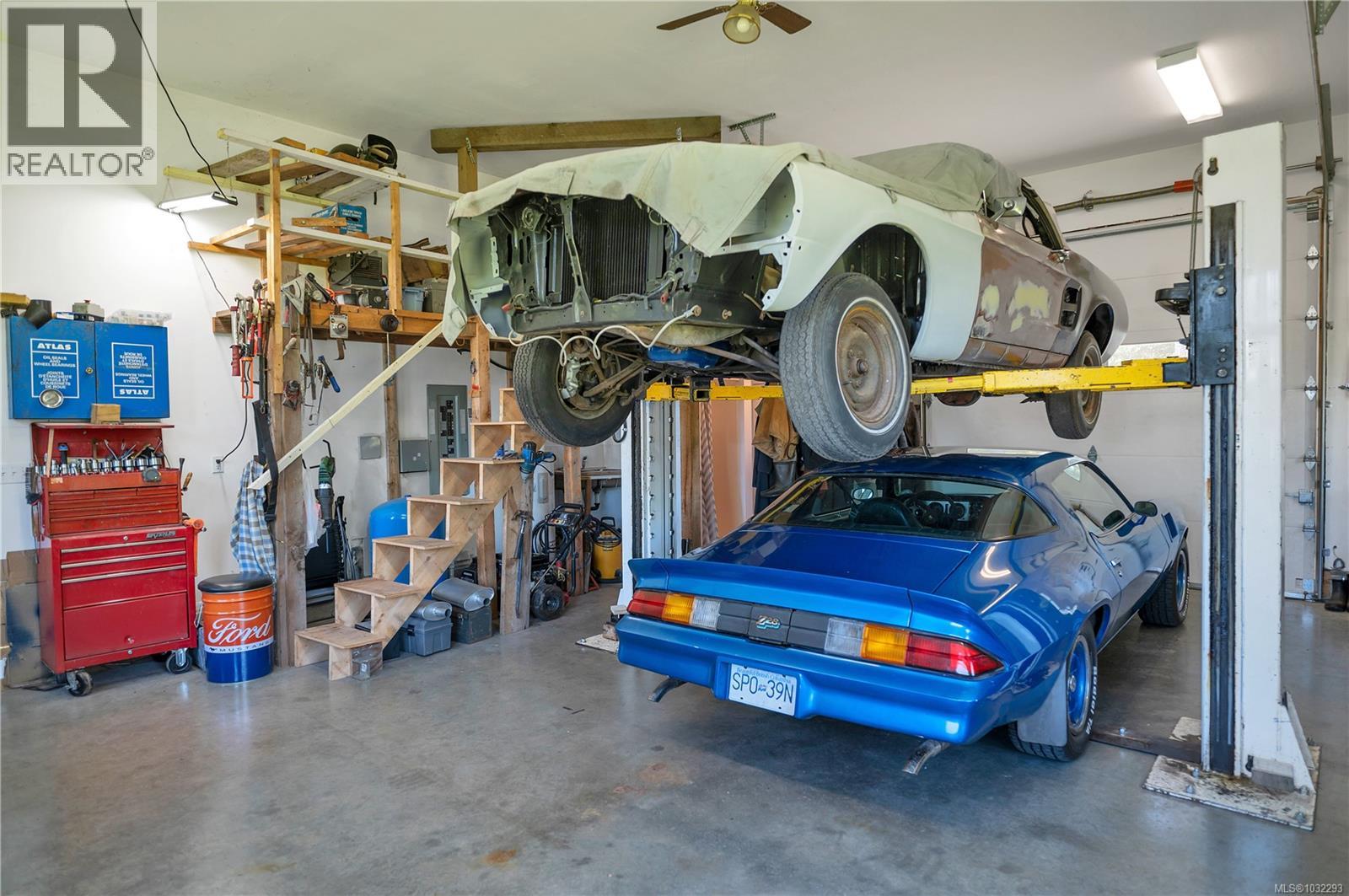 inside the shop, steps up to the mezzanine/storage area