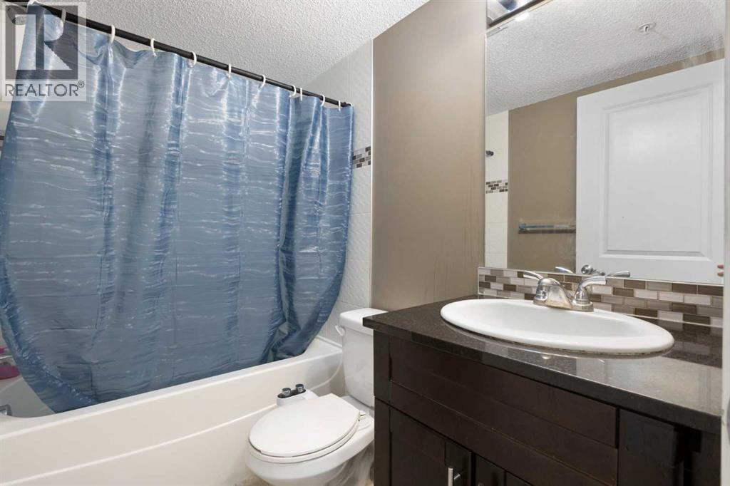 #312 5 SADDLESTONE WAY NE - 9