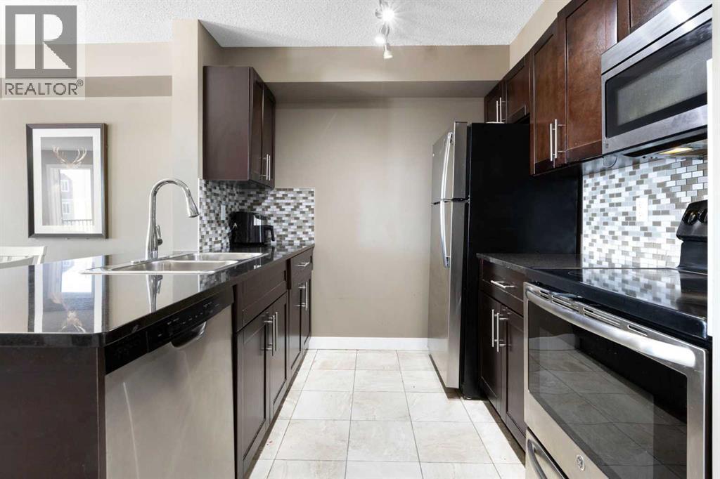 #312 5 SADDLESTONE WAY NE - 11