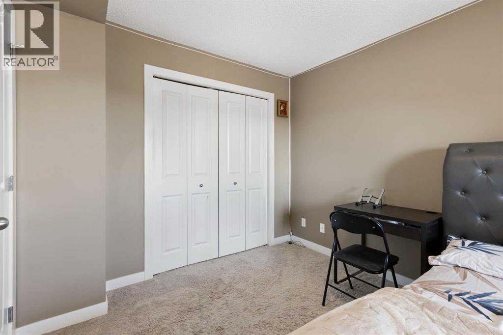 #312 5 SADDLESTONE WAY NE - 26
