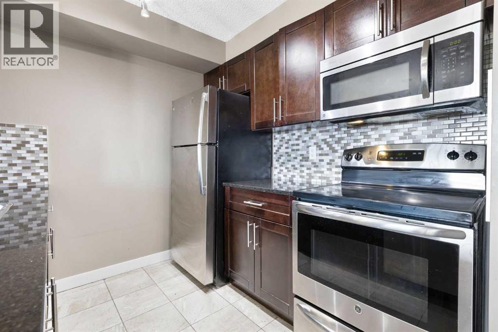 #312 5 SADDLESTONE WAY NE - 12