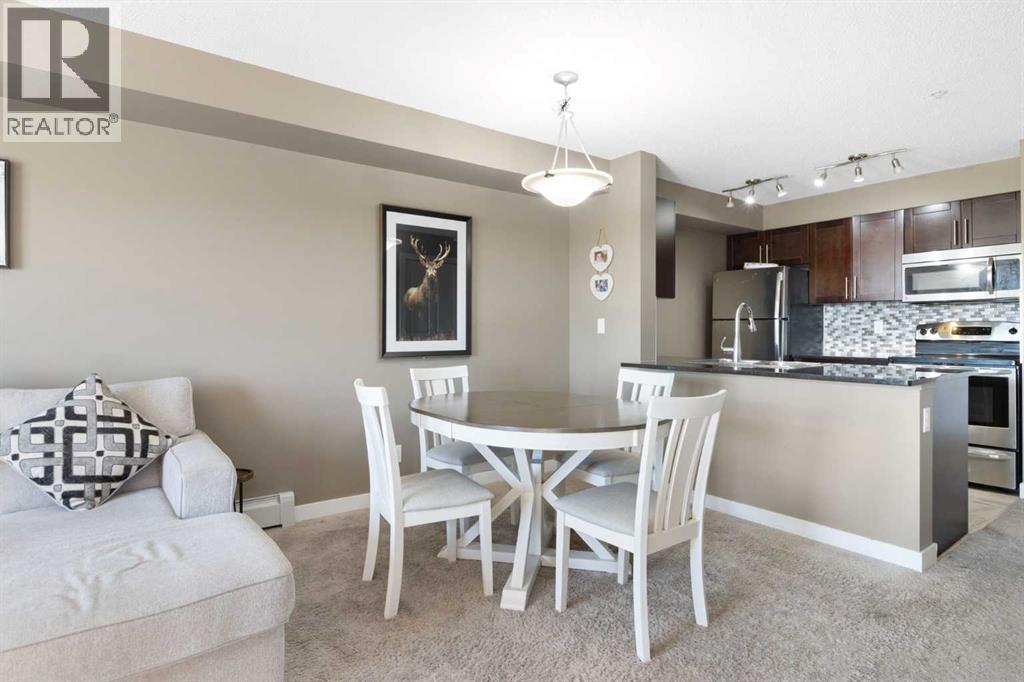 #312 5 SADDLESTONE WAY NE - 17