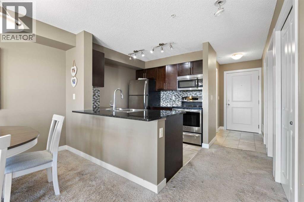 #312 5 SADDLESTONE WAY NE - 15