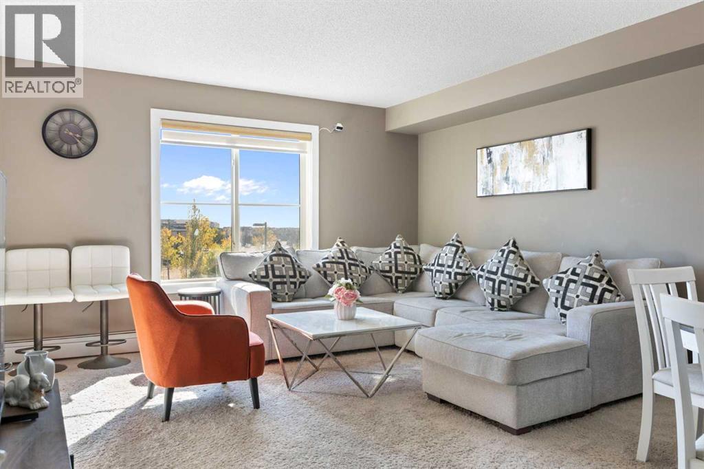 #312 5 SADDLESTONE WAY NE - 24