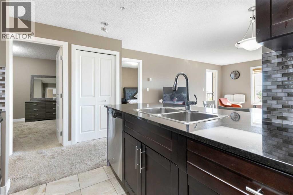 #312 5 SADDLESTONE WAY NE - 13