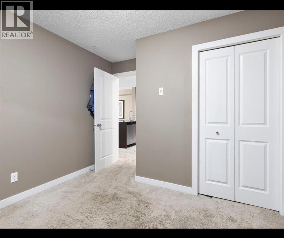 #312 5 SADDLESTONE WAY NE - 28