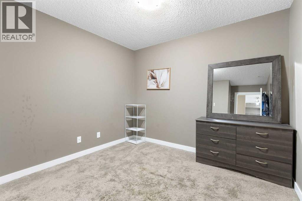 #312 5 SADDLESTONE WAY NE - 27
