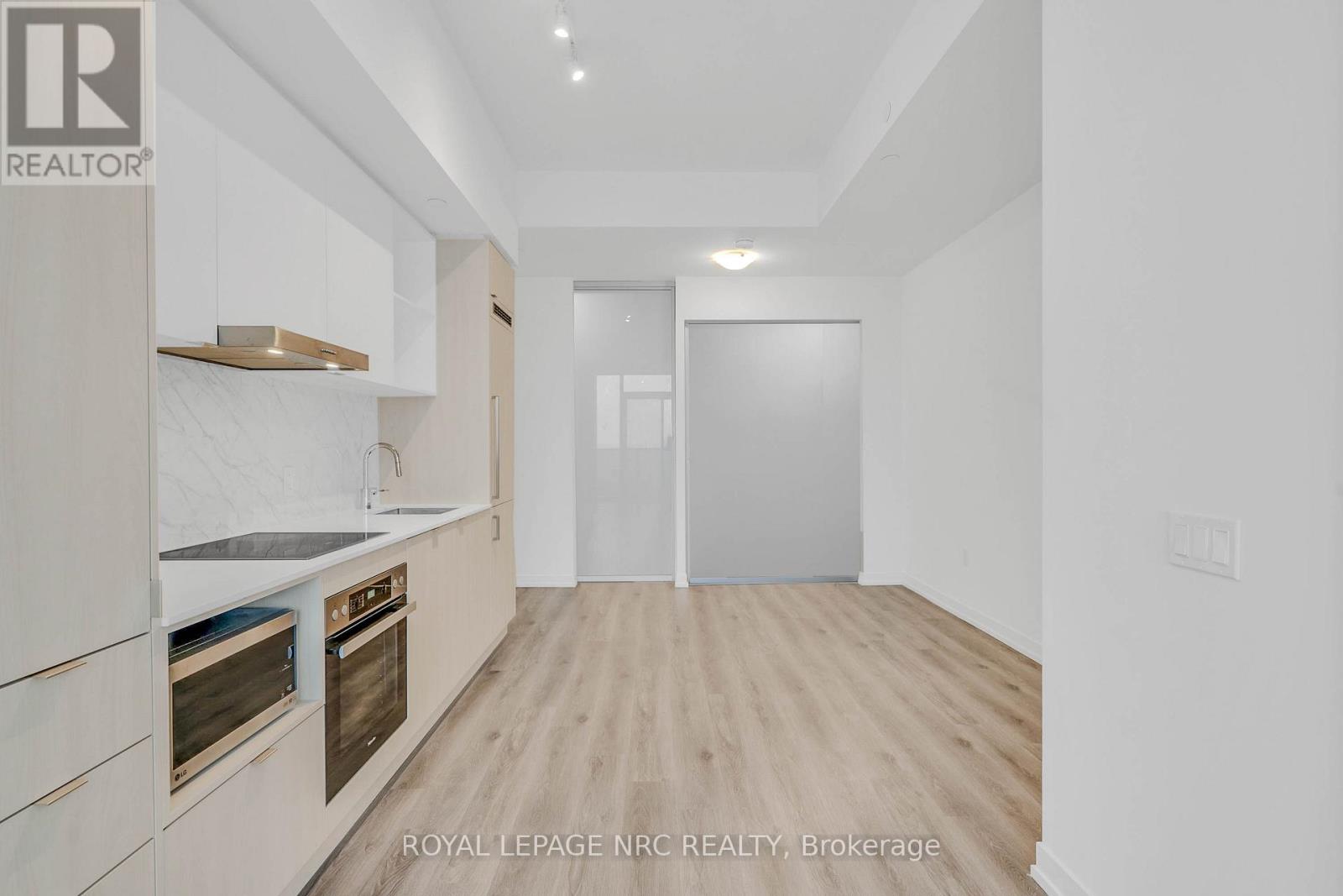 Kitchen, Dining ~ Den & bedroom glass doors closed