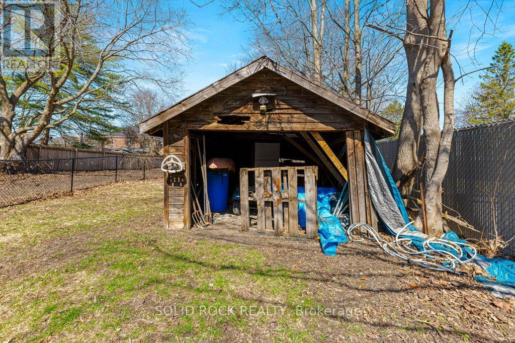 Close-up of rustic rear storage building