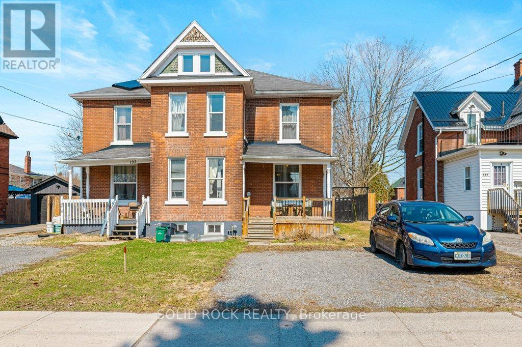 Neighbour's half of home on left& subject property