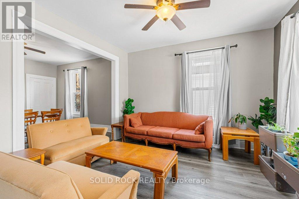 Living room opens into dining area