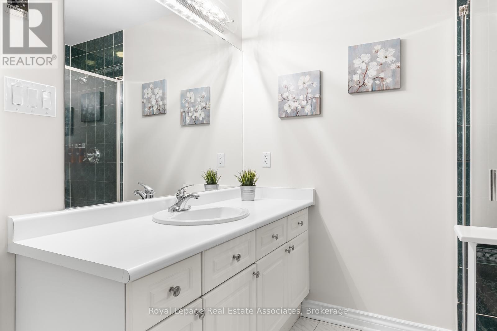 #94 5480 GLEN ERIN DRIVE - 27