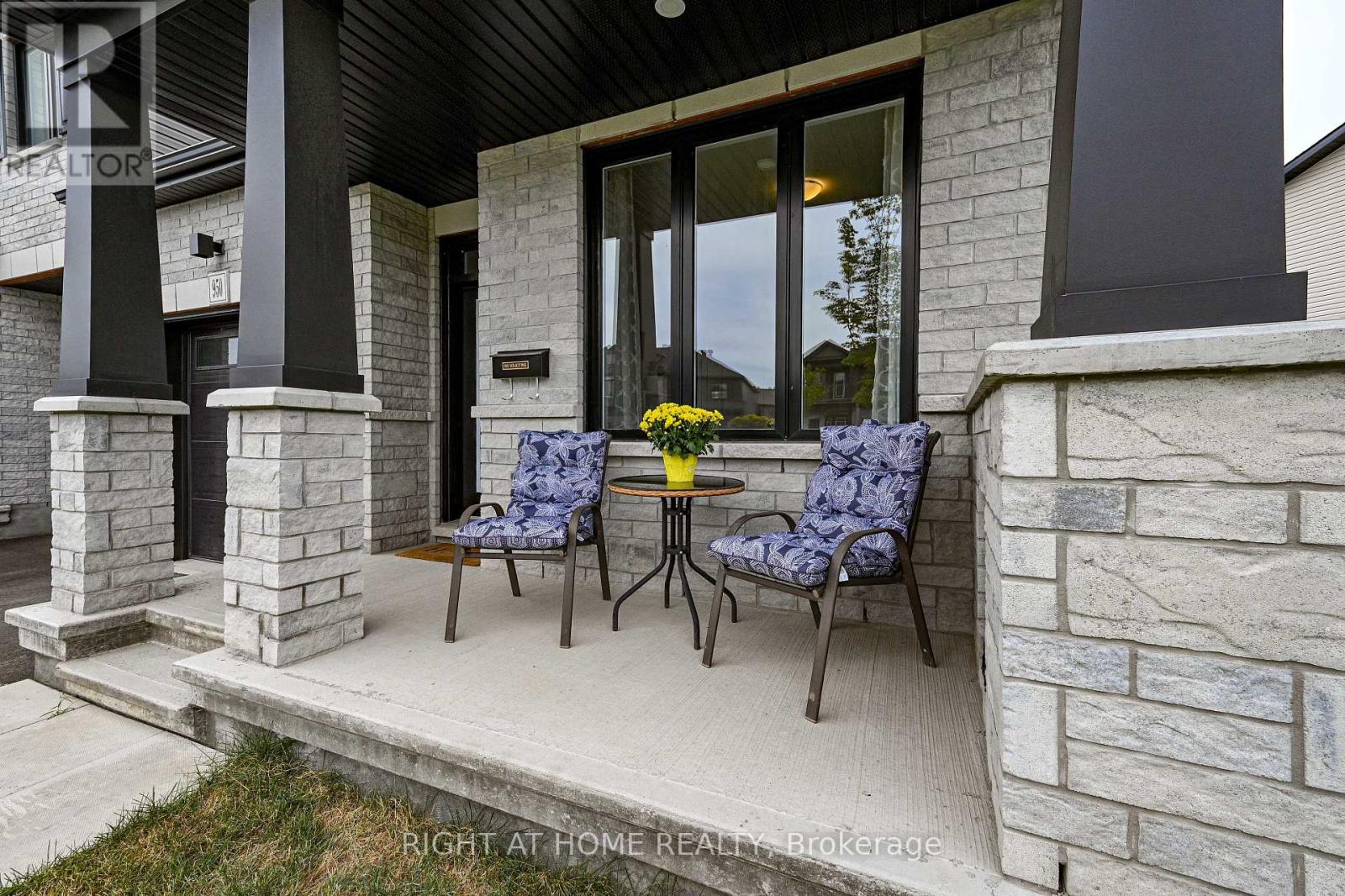Modern trim, window frames, and white brick.