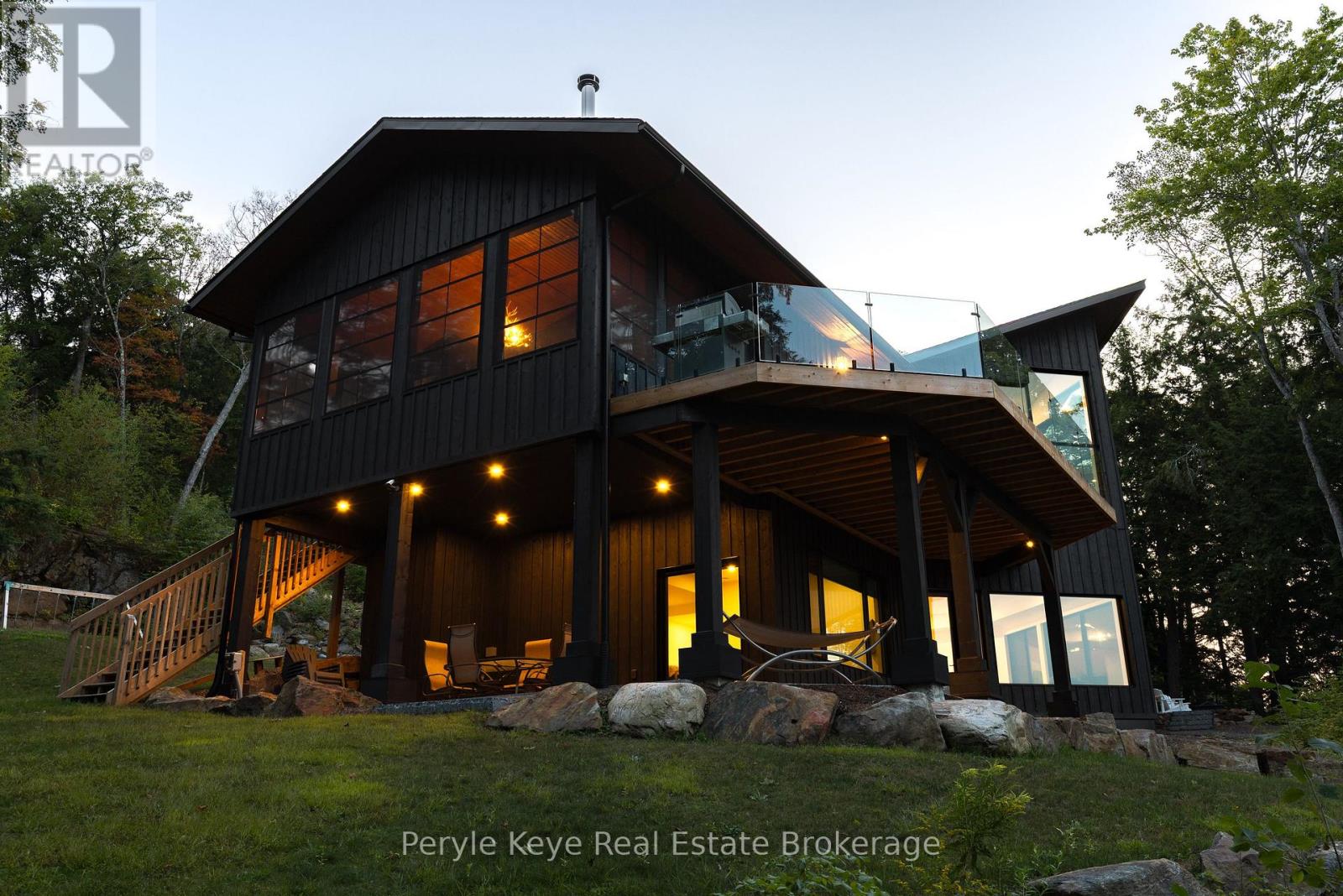 Primary Suite Walkout to Private Patio + Lake View