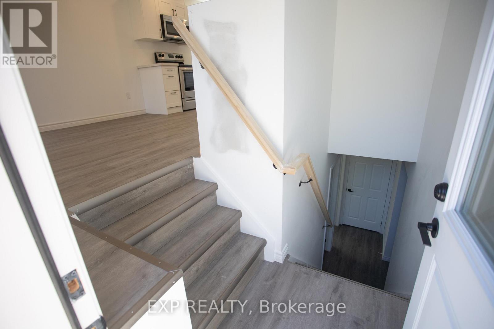 Garden Suite Stairs to Lower Level