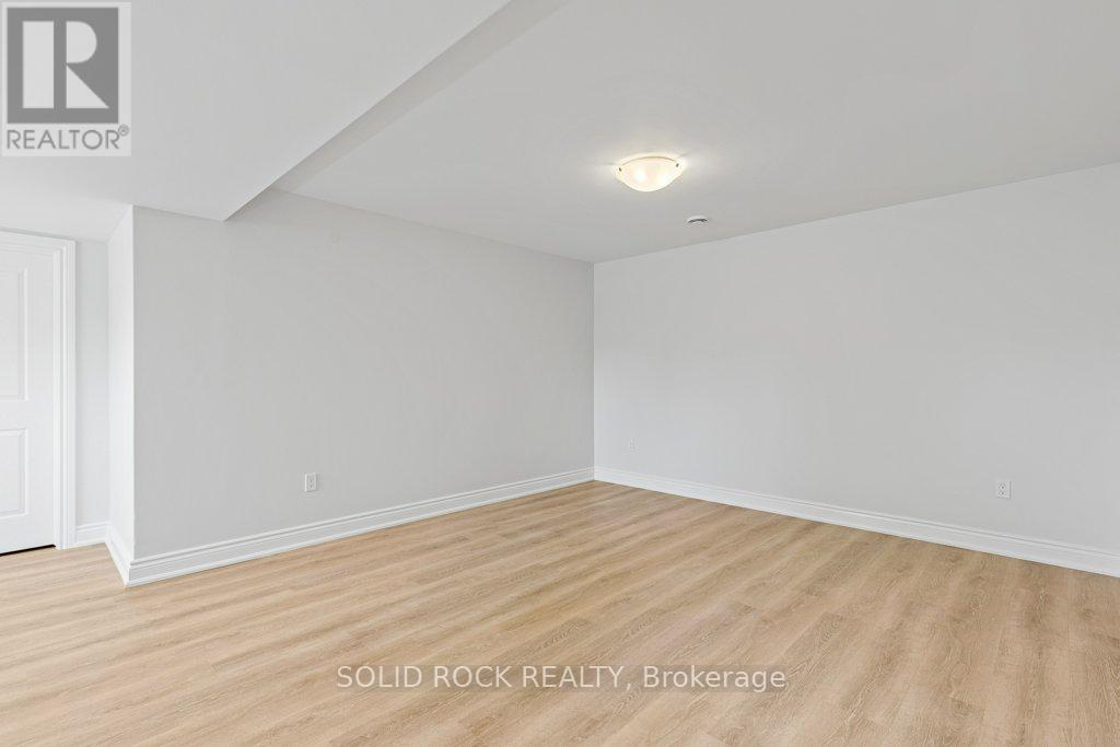 Lower level family room with high ceilings