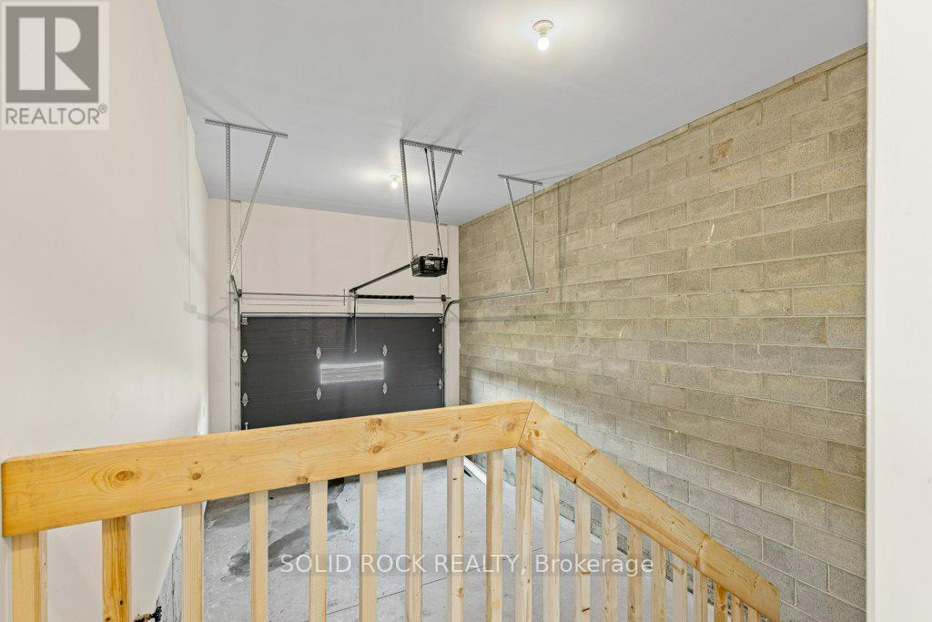Garage interior with railing/auto gar dr opener