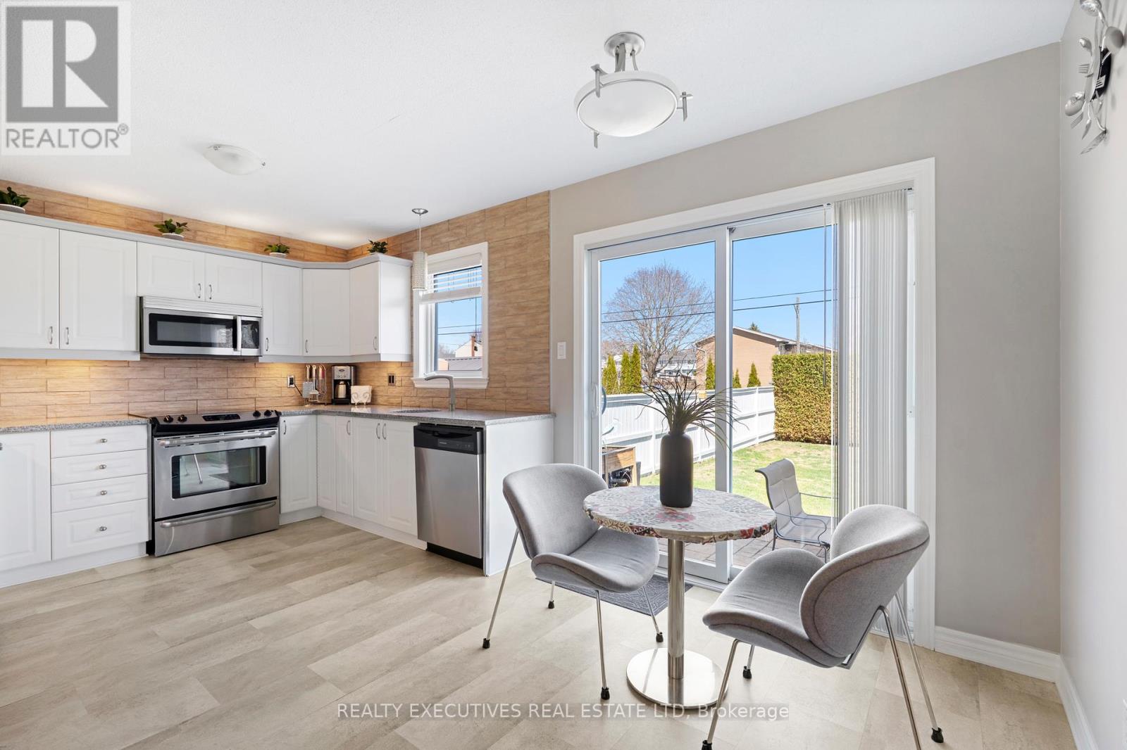 Open Concept Kitchen with Patio Doors