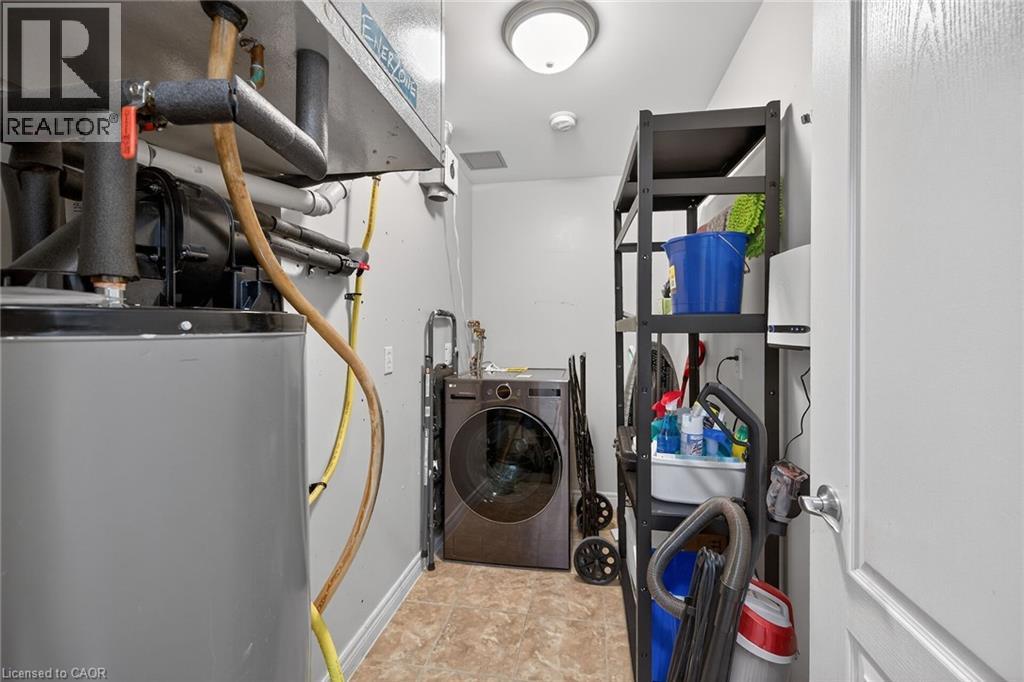 59 CRITZIA Drive Unit# 215, Mount Hope, Ontario, L0R1W0 — Photo 24