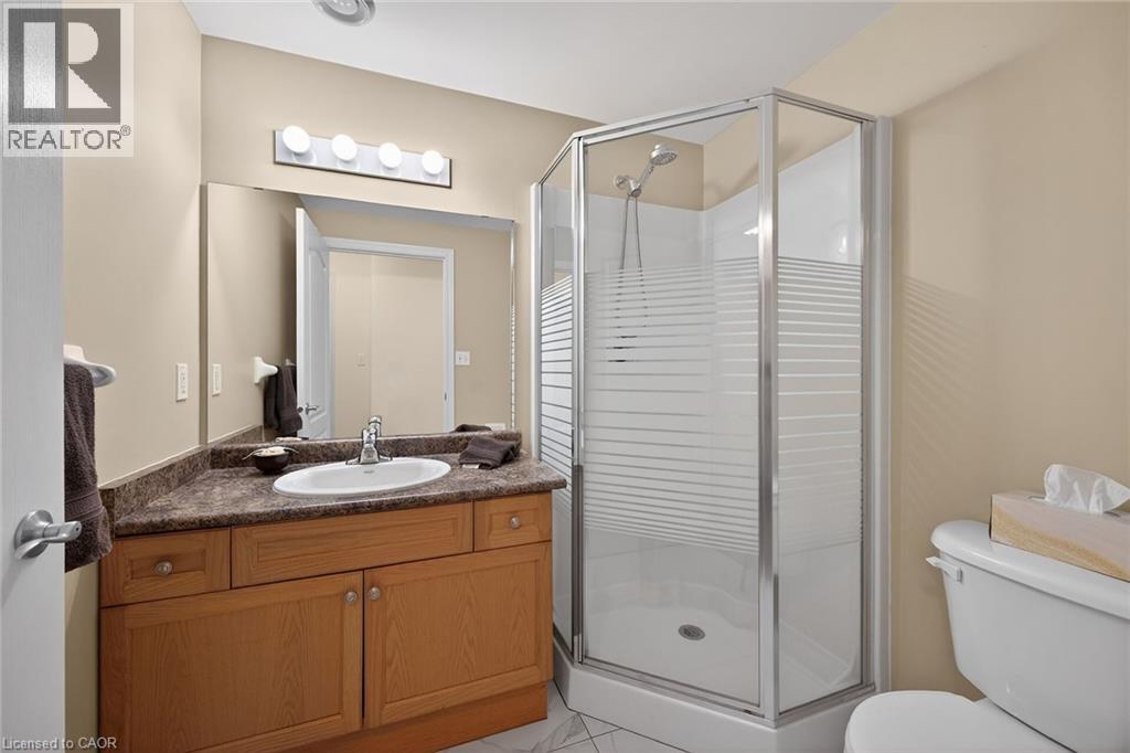 59 CRITZIA Drive Unit# 215, Mount Hope, Ontario, L0R1W0 — Photo 23