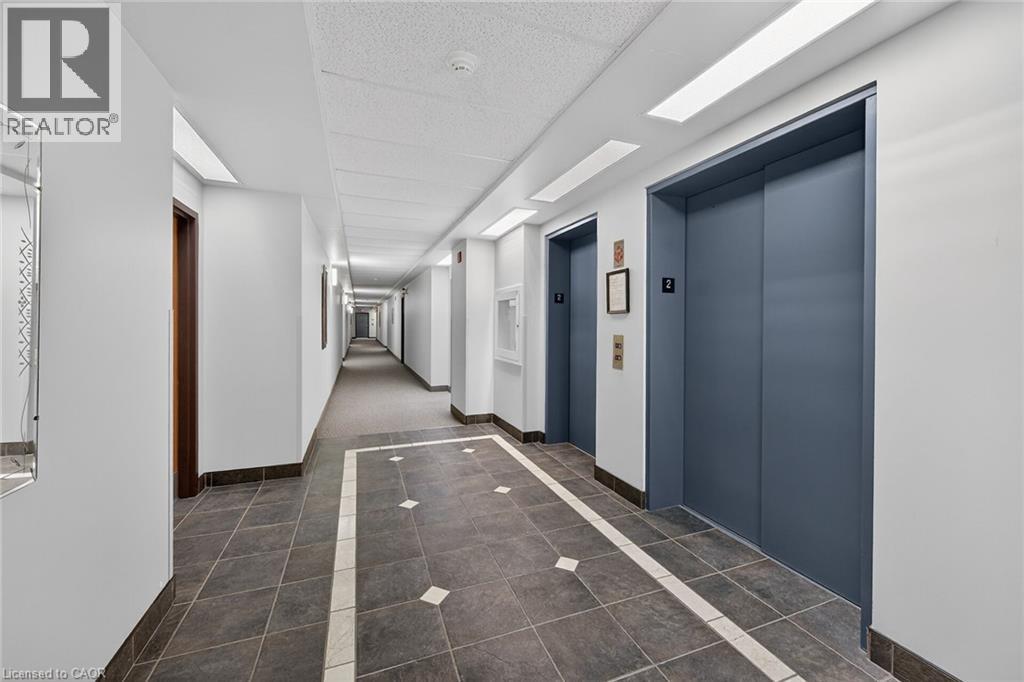 59 CRITZIA Drive Unit# 215, Mount Hope, Ontario, L0R1W0 — Photo 28