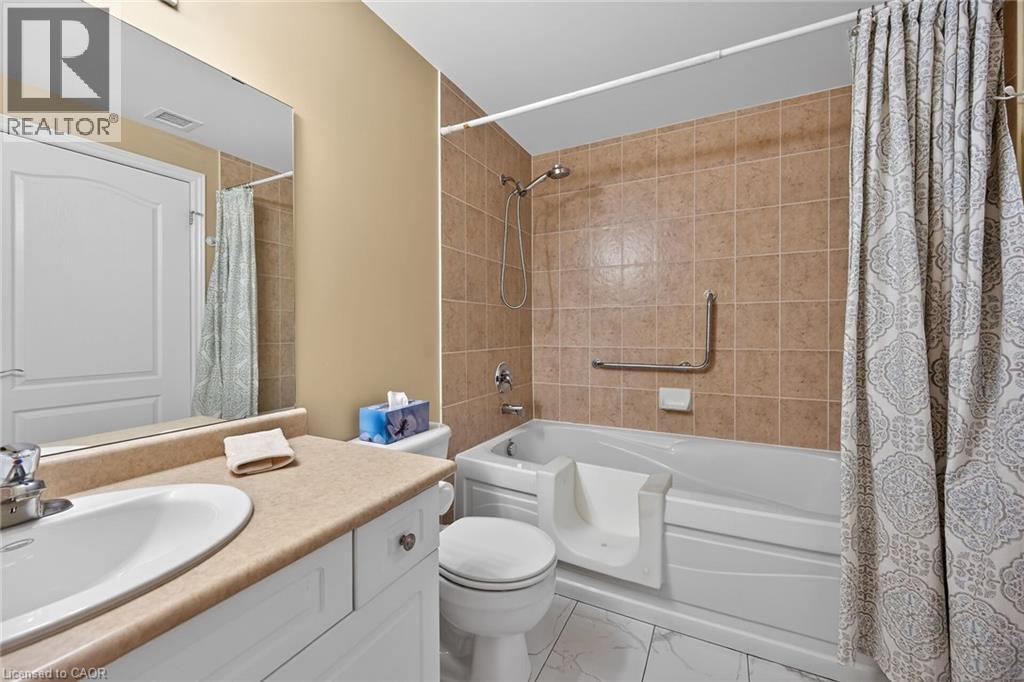 59 CRITZIA Drive Unit# 215, Mount Hope, Ontario, L0R1W0 — Photo 20