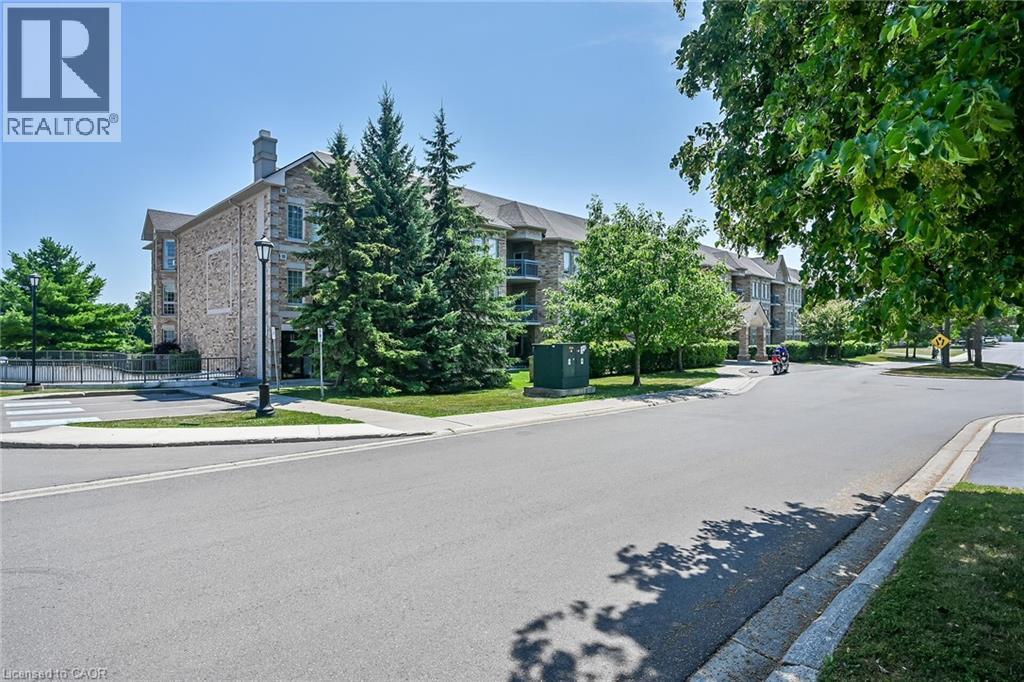 59 CRITZIA Drive Unit# 215, Mount Hope, Ontario, L0R1W0 — Photo 3