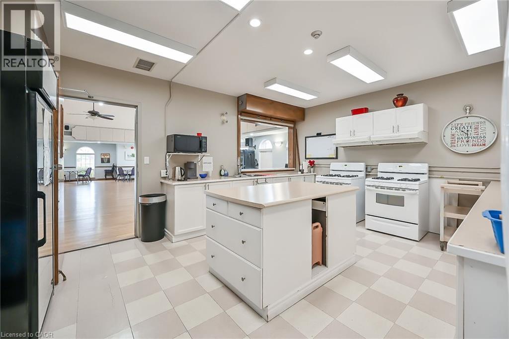 59 CRITZIA Drive Unit# 215, Mount Hope, Ontario, L0R1W0 — Photo 37