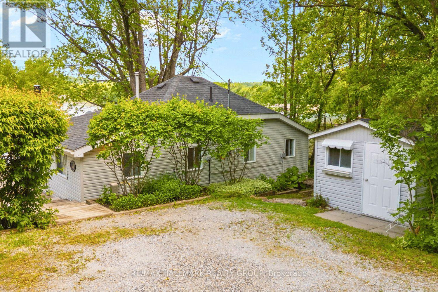 Private driveway with shed and yard space
