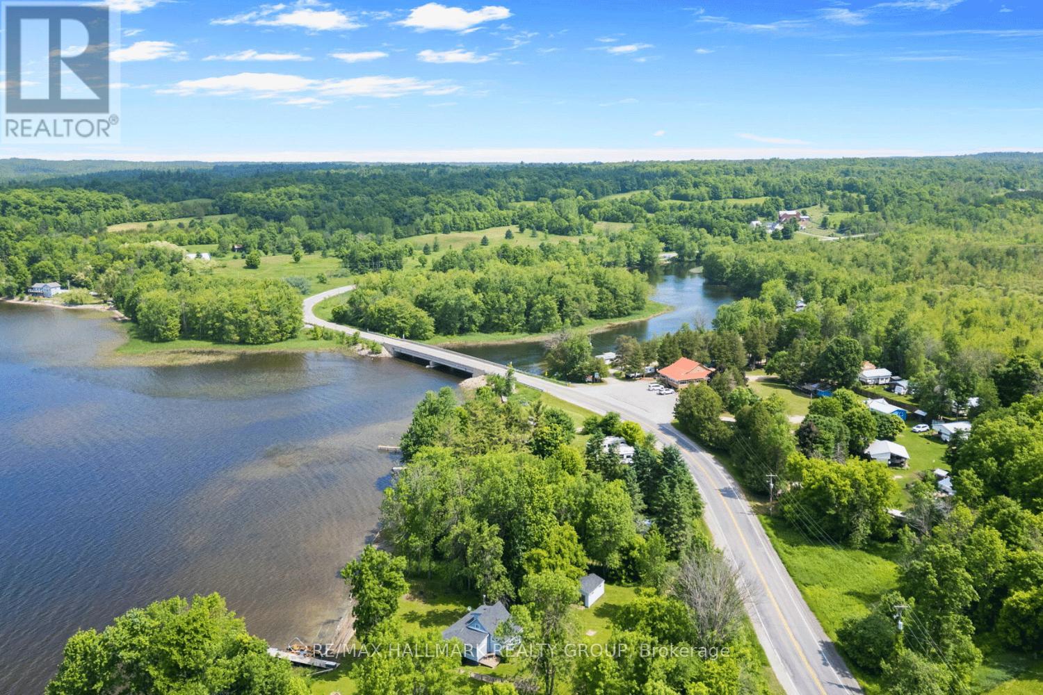 Scenic river and bridge within natural setting