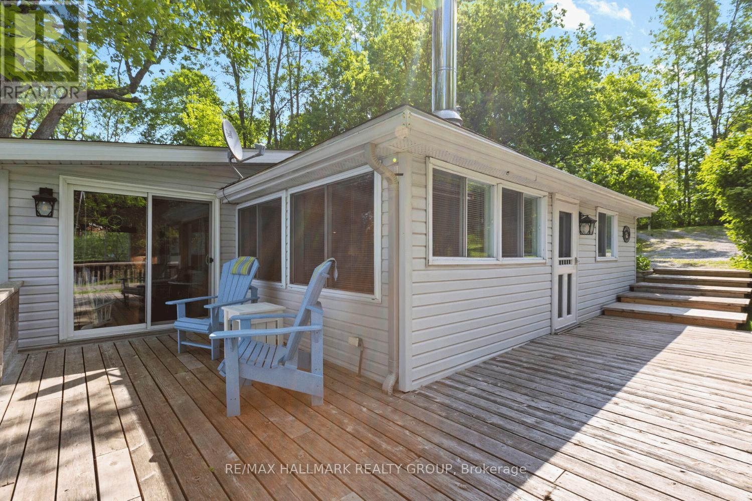 Front exterior with deck and seating area